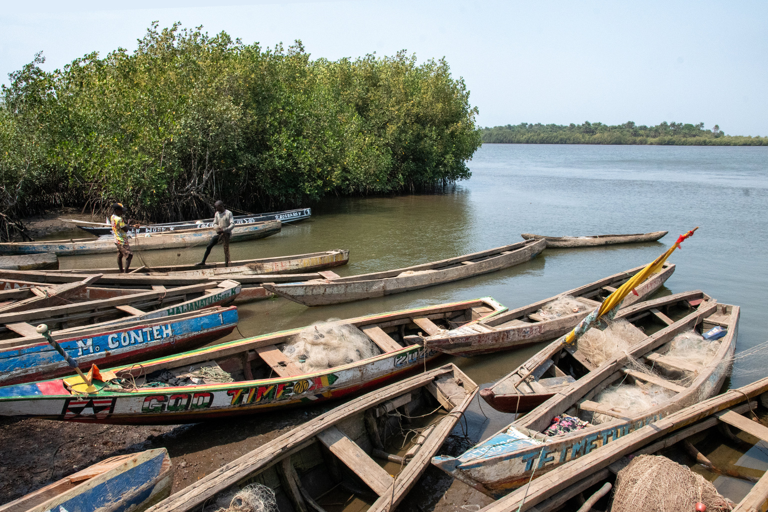 Boats with channel fishing nets.