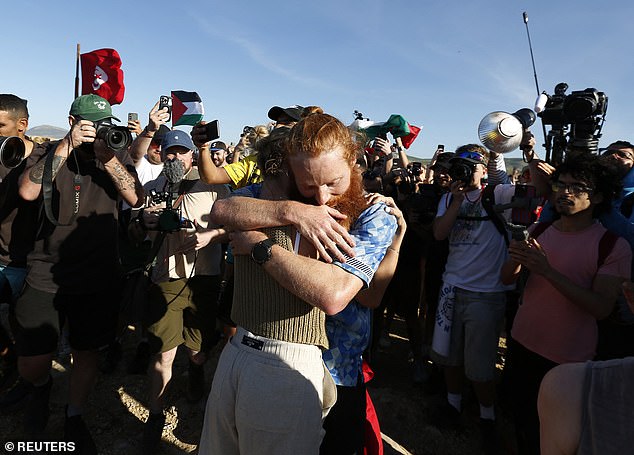 Cook reacts after becoming the first person to run the entire length of Africa yesterday