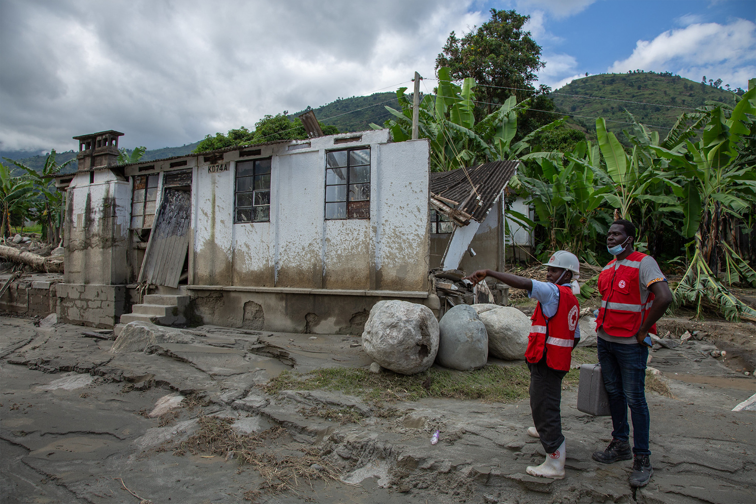 Red Cross teams going through the Kilembe area to assess the extent of destruction after river Nyamwamba burst its banks. May 2020. 