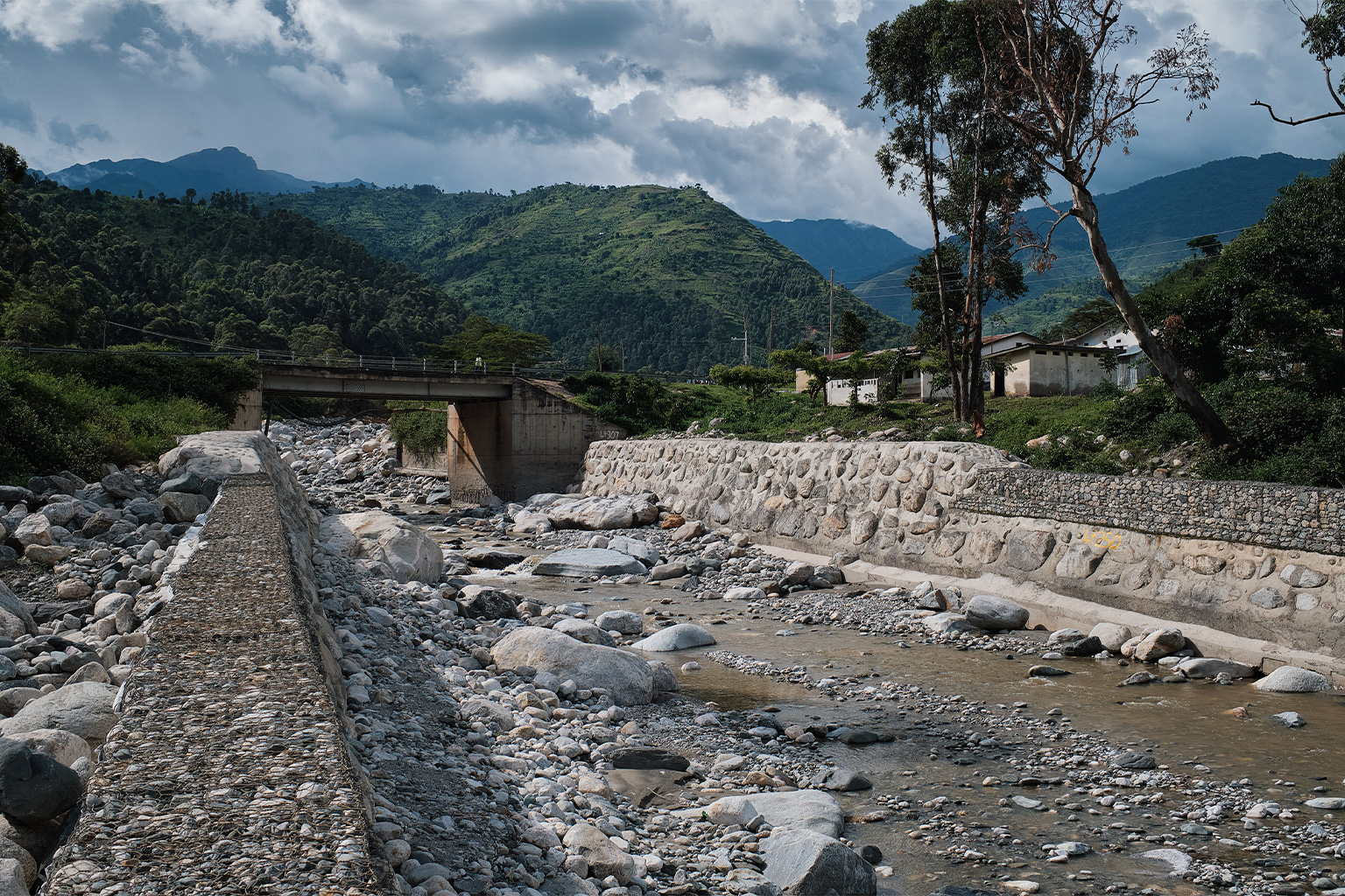 In some of the bigger towns along the Nyamwamba, stone embankments have been built to contain it.