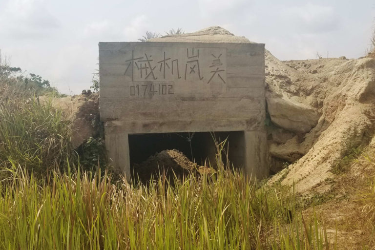 The abandoned mining site left behind by Transatlantique Cameroon Ltd in Akak I. Image © Yannick Kenné.