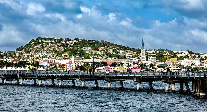 A bridge against the beautiful cityscape of Georgetown in Guyana. Image used under license from Shutterstock.com.