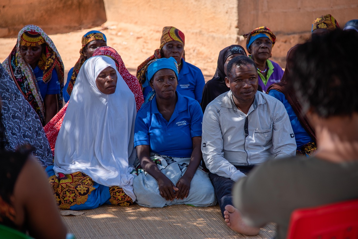 Women participate in community meetings