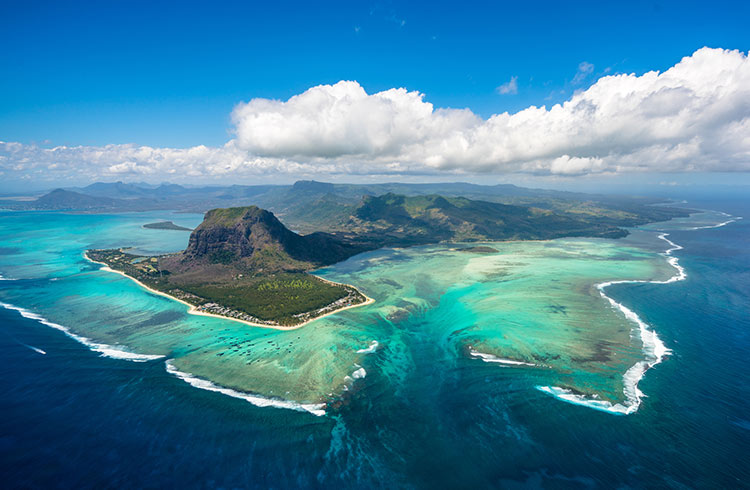 Mountainous island and the clear water as seen from above