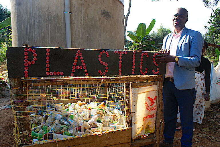 Plastic is put to use for water saving sustainable agriculture at St. Maria Gorreti Mpugwe Primary School in Uganda. Image by David Njagi for Mongabay.