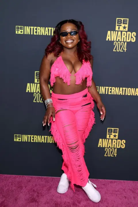 Getty Images South African artist Makhadzi walks the BET Award red carpet.