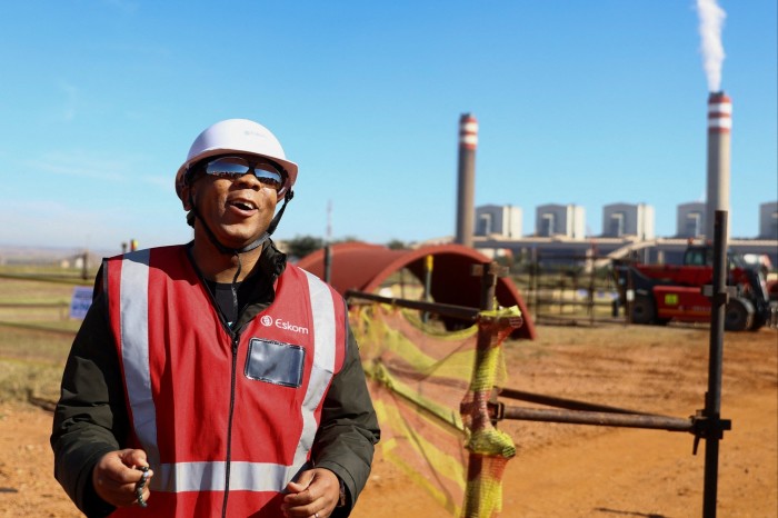 South Africa’s electricity  minister Kgosientso Ramokgopa inspects a power station in  Mpumalanga province