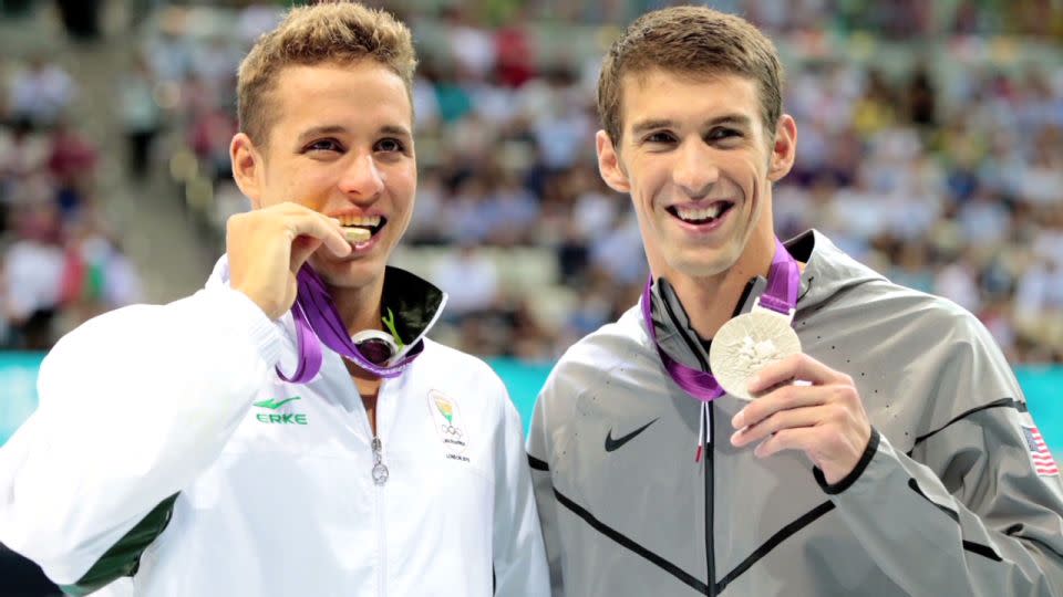 Chad Le Clos (left) and Michael Phelps (right) show off their medals at the 2012 London Olympic Games. - Getty Images