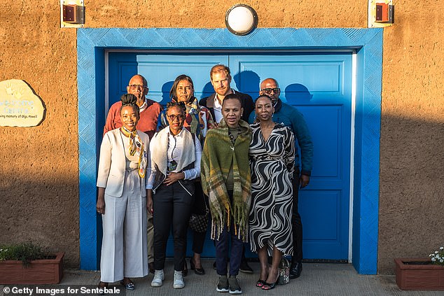 Harry poses for a photo at Sentebale's Mamohato Children's Centre in Lesotho yesterday