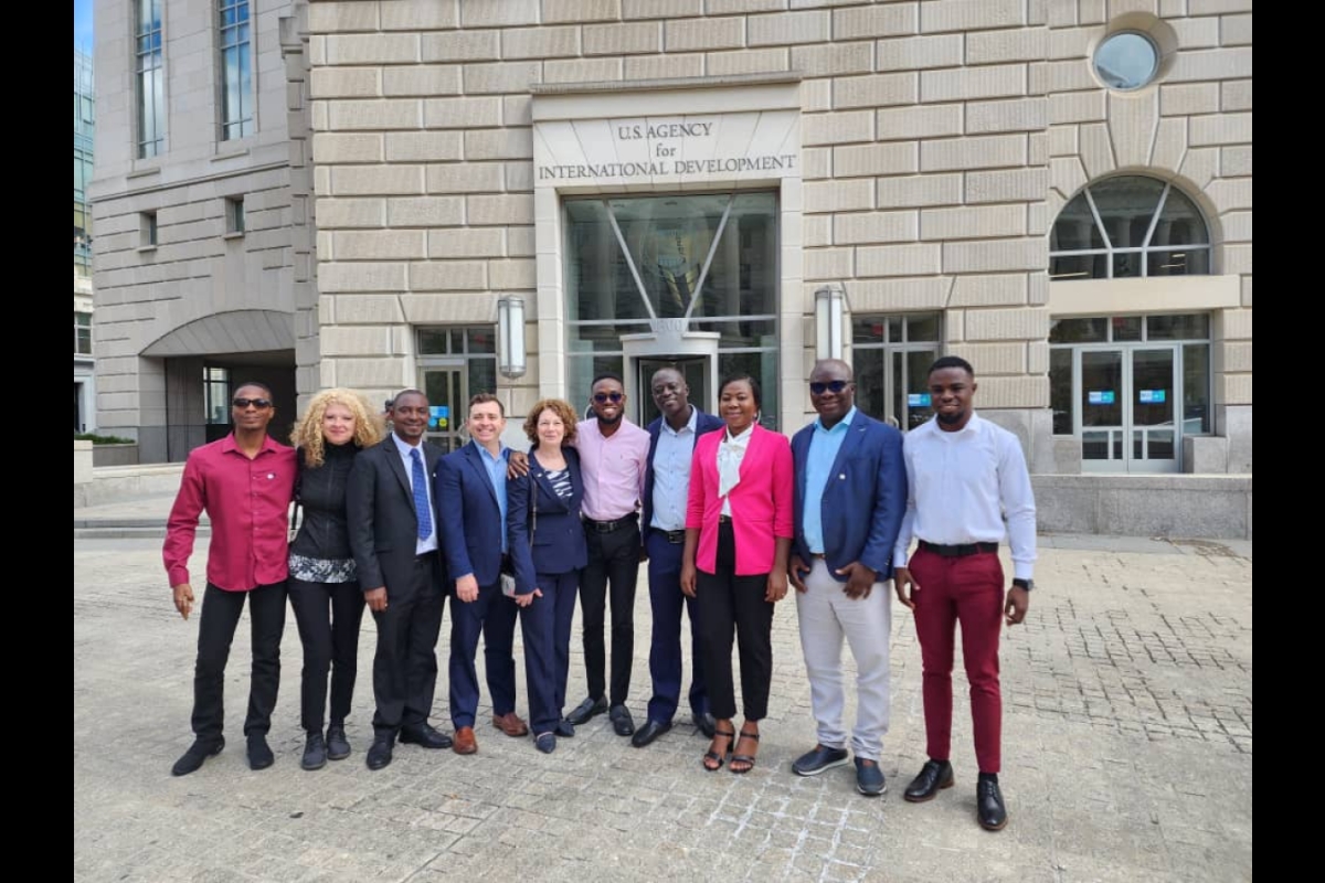 CARISCA team members pose for a group photo outside of the U.S. Agency for International Development building.