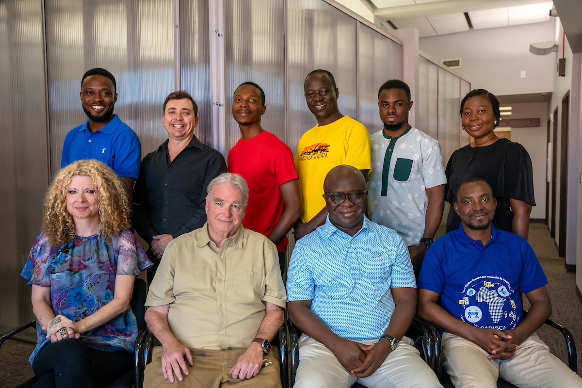 CARISCA team members pose for a group photo.