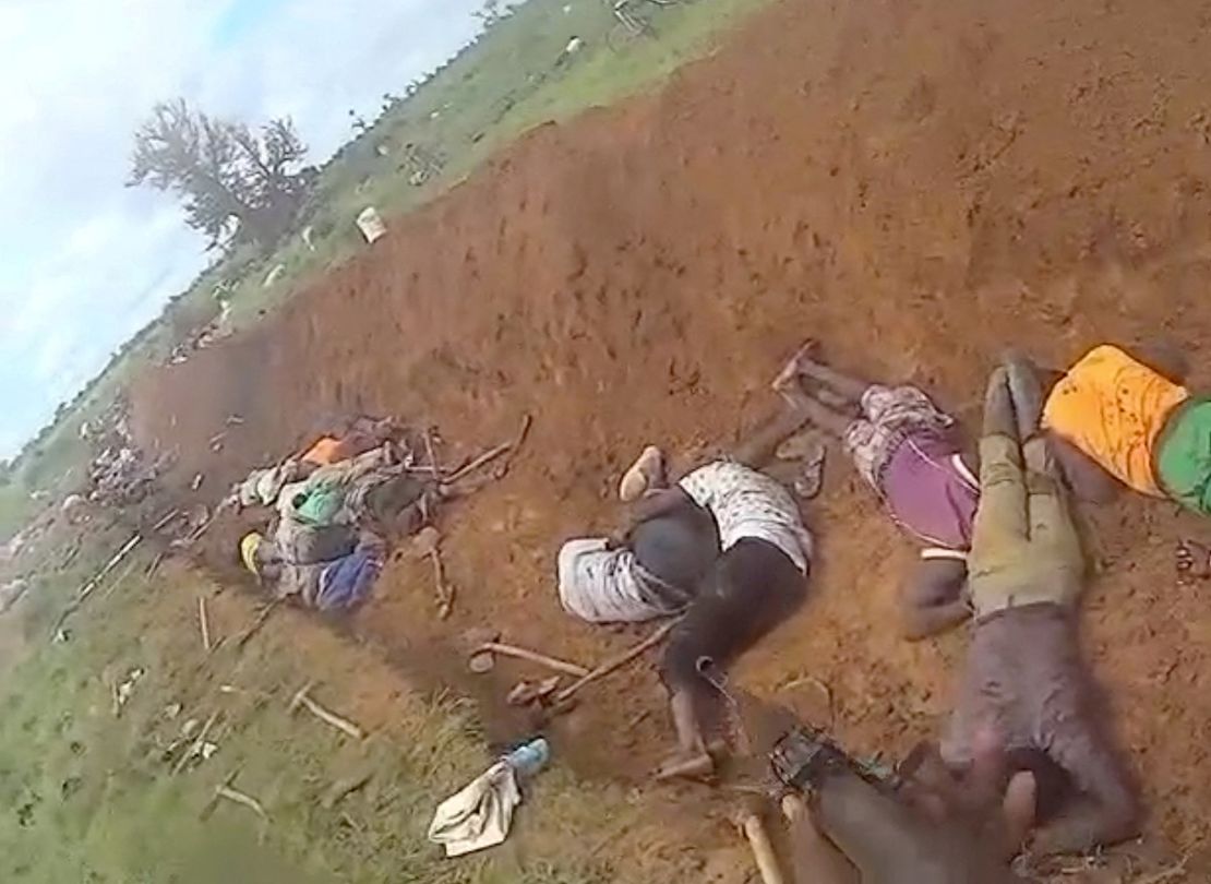 A screen grab from a video shared on social media on August 24, 2024, shows the bodies of people who were killed by jihadists as they were digging a trench to protect their town of Barsalogho, Burkina Faso.