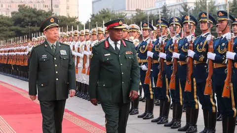 MND General Li Zuocheng, of China, and General Constantine Guveya Chiwenga, of Zimbabwe